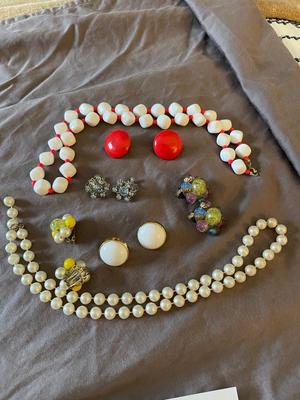TWO NECKLACES AND CLIP ON EARRINGS