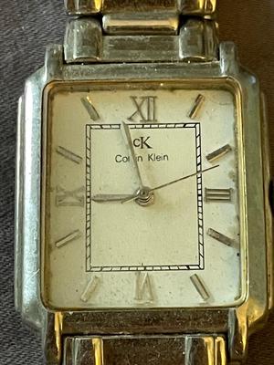 FOUR MEN'S WATCHES FOR PARTS OR REPAIR