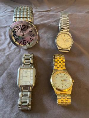 FOUR MEN'S WATCHES FOR PARTS OR REPAIR