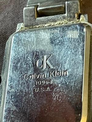 FOUR MEN'S WATCHES FOR PARTS OR REPAIR