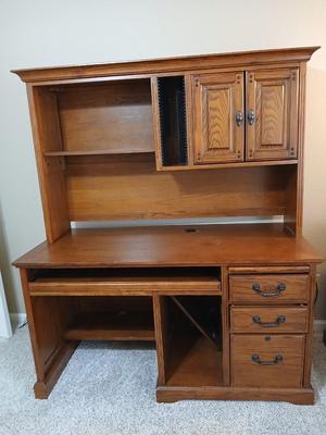 Golden Oak Desk with top hutch with two drawer keys and an office chair