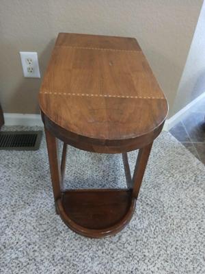 Small half oval end table with inlayed wood top design