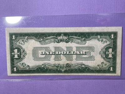 SERIES OF 1928 CRISP AU/UNCIRCULATED "FUNNY BACK" SILVER CERTIFICATE AS PICTURED.