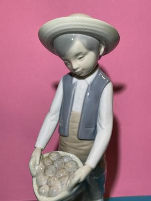 Nao by Lladro 8.5" Porcelain Farmer Boy w/Basket & Bag of Potatoes Figurine as Pictured.