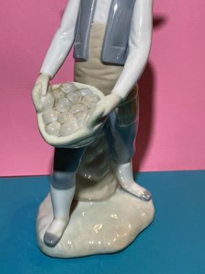 Nao by Lladro 8.5" Porcelain Farmer Boy w/Basket & Bag of Potatoes Figurine as Pictured.
