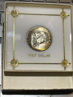 1951-S CHOICE BU CONDITION/TONED RIMS FRANKLIN SILVER HALF DOLLAR IN A CAPITAL HOLDER AS PICTURED.