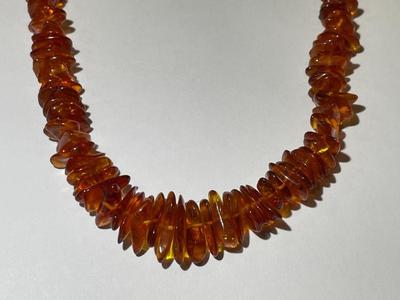 Vintage 18" Baltic Amber Graduated Bead Necklace in VG Preowned Condition as Pictured.