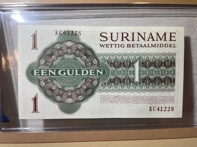 Surinam 1 Gulden 1974 Banknote/Currency in Uncirculated Condition by Fleetwood as Pictured.