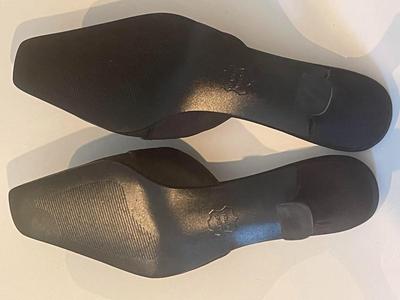 Brand New black mules by Impo in size 6.5