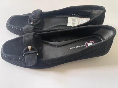 Brand New pair of black flats by Bandolino in size 6