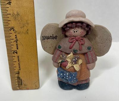 November Clay Doll Figurine