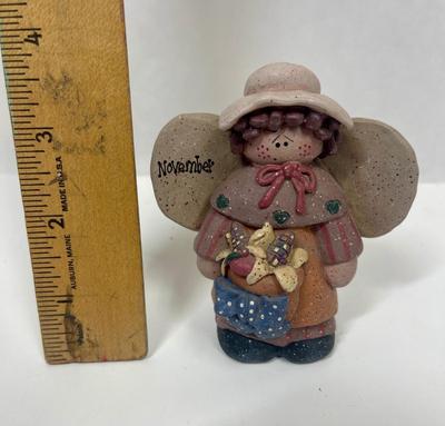 November Clay Doll Figurine