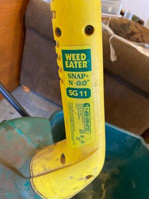 WEED EATER, FERTILIZER SPREADER, SPRINKLER & WALL HOOKS