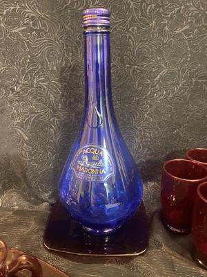 GORGEOUS RED GLASS, CHAMPAGNE GLASSES, & VINTAGE BLUE WATER BOTTLE AND VASE