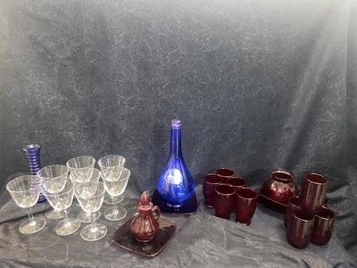 GORGEOUS RED GLASS, CHAMPAGNE GLASSES, & VINTAGE BLUE WATER BOTTLE AND VASE