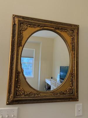 Beautiful gold adorned mirror