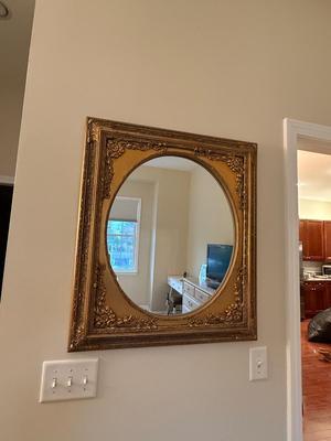 Beautiful gold adorned mirror