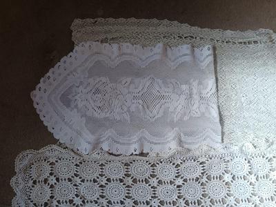 THREE WHITE DOILIES