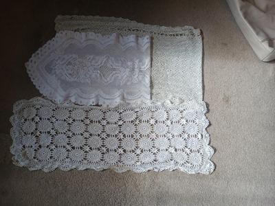THREE WHITE DOILIES