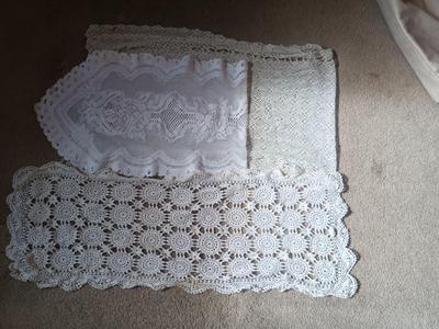 THREE WHITE DOILIES