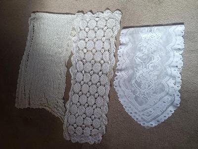 THREE WHITE DOILIES