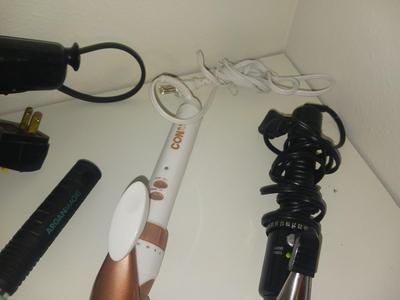 TWO CONAIR CURLING IRON, BLOW DRYER AND BRUSH