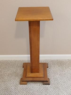 Plant stand - homemade small round table with tablecloth, lace, and Doiley