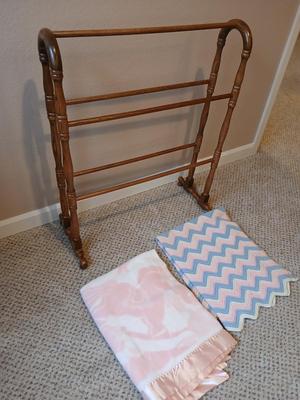 Oak Quilt rack with two baby blankets