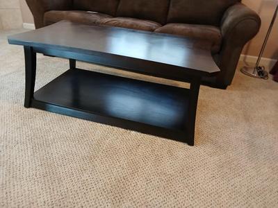 Two tone finish round coffee table on casters - easy to move!