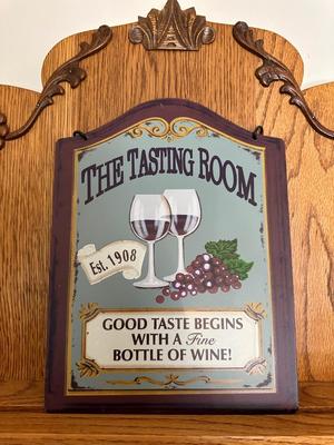 WOODEN WALL SHELF WITH A TASTING ROOM SIGN