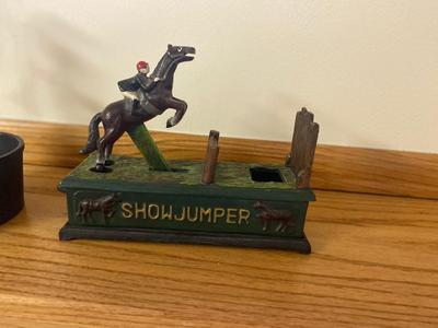 COOL CAST-IRON SHOWJUMPER BANK AND WATER WELL PUMP