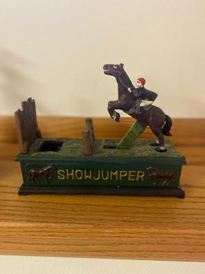 COOL CAST-IRON SHOWJUMPER BANK AND WATER WELL PUMP