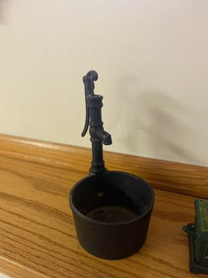 COOL CAST-IRON SHOWJUMPER BANK AND WATER WELL PUMP
