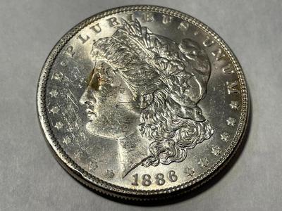 1886-P MS60/UNCIRCULATED CONDITION (UNCERTIFIED) MORGAN SILVER DOLLAR AS PICTURED.