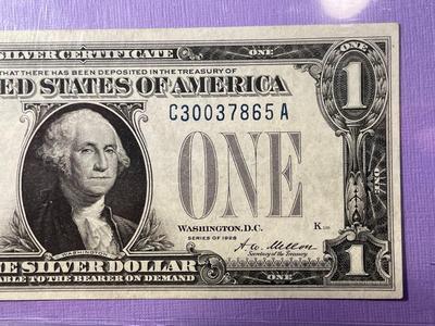SERIES OF 1928 CRISP AU/UNCIRCULATED "FUNNY BACK" SILVER CERTIFICATE AS PICTURED.