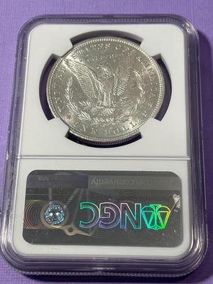 NGC CERTIFIED 1879-O MS60 WHITE MORGAN SILVER DOLLAR AS PICTURED. FREE SHIPPING.