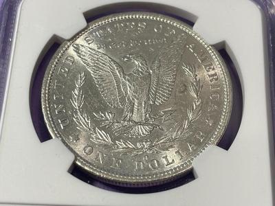 NGC CERTIFIED 1879-O MS60 WHITE MORGAN SILVER DOLLAR AS PICTURED. FREE SHIPPING.
