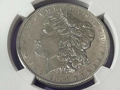 NGC CERTIFIED 1884-S AU DETAILS CLEANED MORGAN SILVER DOLLAR AS PICTURED. FREE SHIPPING.