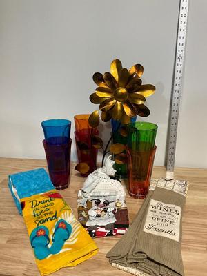 Cups, metal art, and towels