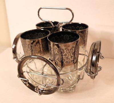 Lot #118 MCM Dorothy Thorpe Style Barware set with Caddy