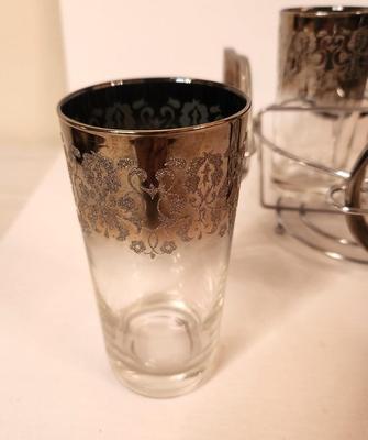 Lot #118 MCM Dorothy Thorpe Style Barware set with Caddy