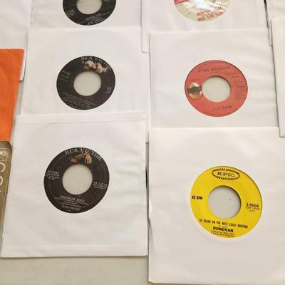 Lot of 35 Vinyl Records 45 rpm elvis Presley Donovan. Beach boys , brenda lee herman's hermits
