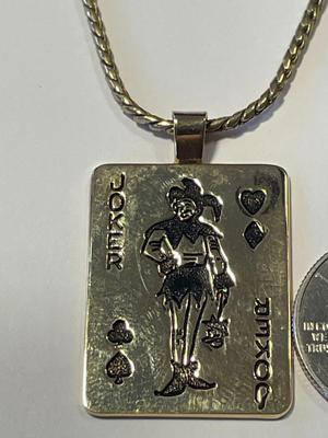 Vintage SIMMONS Gold-tone Joker Pendant on a 20" Chain in Good Preowned Condition.