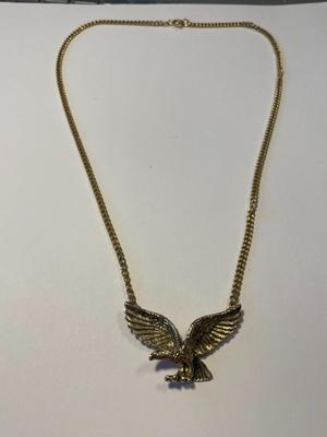 Vintage Avon Collectible Flying Eagle Gold-tone Pendant on a Chain Necklace 19" Long in Good Preowned Condition.