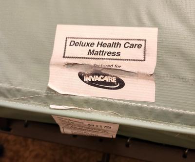 Lot #154 InvaCare Adjustable Hospital Bed w/remote - Works fine