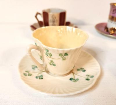 Lot #157 Lot of four Vintage Demitasse Cup sets - one Belleek