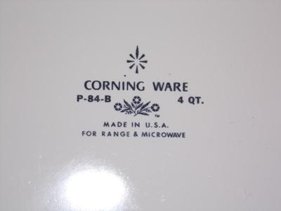 Corning Ware 4 Qt. casserole with matching lid and carrier/stand