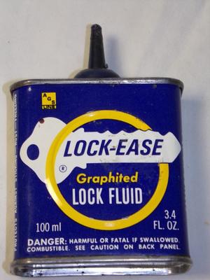 Vintage metal lock lube can, empty