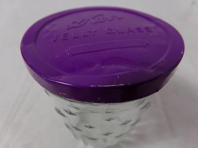 One lonely vintage Kerr jelly glass with a dinged up lid, nice collectible for Christmas.