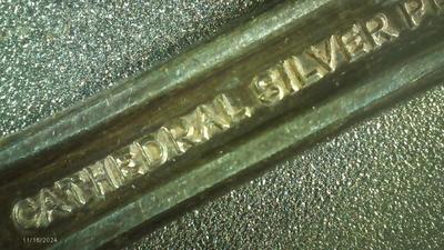 5 Cathedral Silver Plate dinner forks.